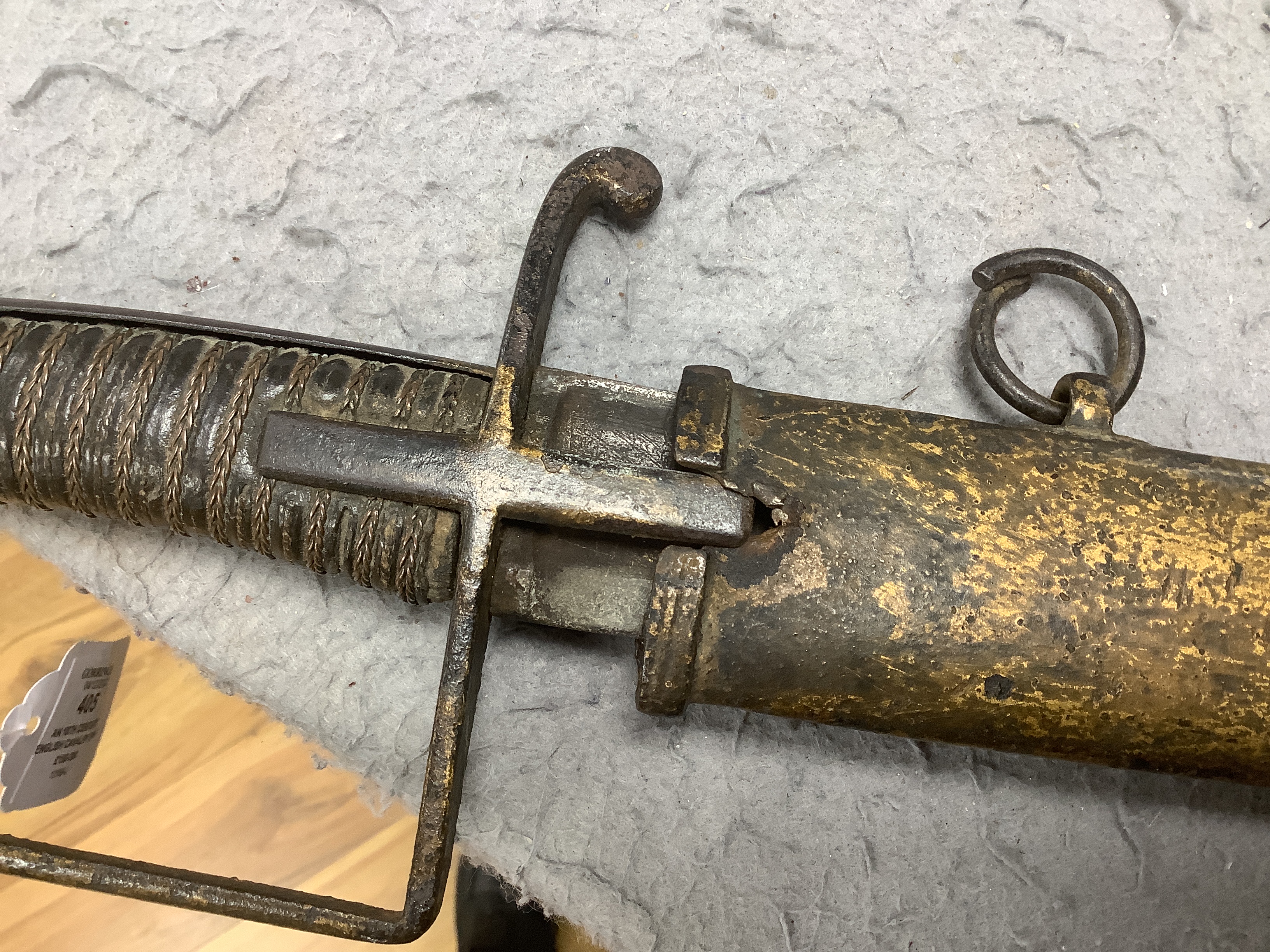 An 18th century English cavalry sword with eastern related engraving to blade